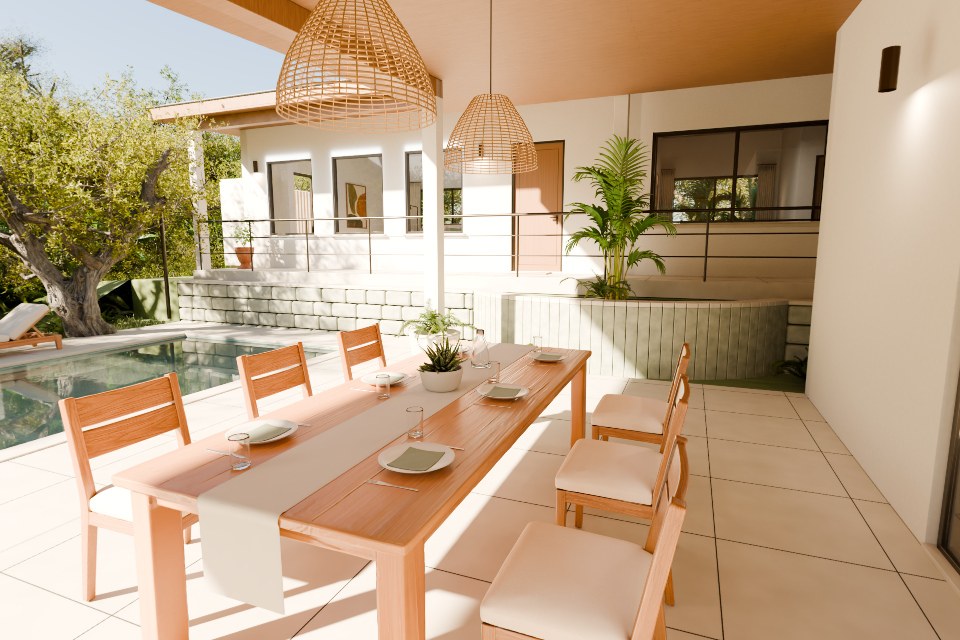 A dressed timber dining table on the covered terrace